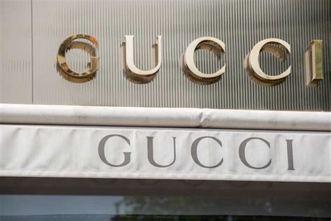 is gucci a corporation|who is gucci owned by.